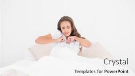  Presentation with bed - PPT theme having yawning-pretty-brunette-lying background and a white colored foreground
