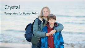  Presentation with winter family - PPT theme consisting of years old boy at seaside background and a sky blue colored foreground