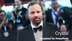  Presentation with red carpet ceremony - PPT theme having yorgos-lanthimos-walks-the-red background and a tawny brown colored foreground