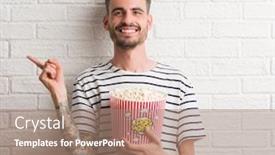  Presentation with white brick wall - Slide set consisting of young adult man eating popcorn standing over white brick wall very happy pointing with hand and finger to the side background and a coral colored foreground
