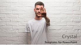  Presentation with white brick wall - PPT theme having young-adult-man-standing-over background and a light gray colored foreground