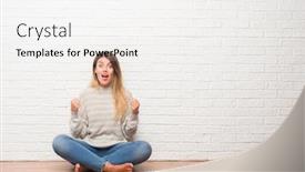  Presentation with white brick - Presentation design featuring young adult woman sitting on the floor over white brick wall at home celebrating surprised and amazed for success with arms raised and open eyes winner concept background and a white colored foreground