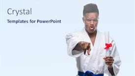  Presentation with kimono - Beautiful PPT theme featuring young african american man over isolated background wearing kimono holding degree pointing with finger to the camera and to you hand sign positive and confident gesture from the front backdrop and a sky blue colored foreground