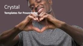  Presentation with american heart - Theme having young african american man wearing grey t-shirt smiling in love showing heart symbol and shape with hands romantic concept background and a dark gray colored foreground