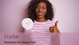  Presentation with sweet candy - PPT theme consisting of young african american woman eating sweet candy standing over isolated pink background happy with big smile doing ok sign thumb up with fingers excellent sign background and a coral colored foreground