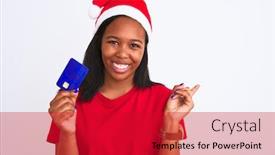 Presentation with christmas card - Slide set enhanced with young african american woman wearing christmas hat and holding credit card very happy pointing with hand and finger to the side background and a crimson colored foreground