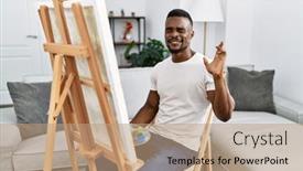  Presentation with canvas - PPT theme consisting of young-african-man-painting background and a coral colored foreground