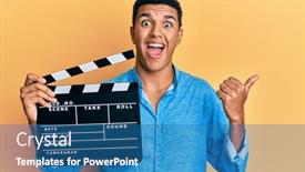  Presentation with clapboard - Audience pleasing slide deck consisting of young-arab-man-holding-video backdrop and a teal colored foreground