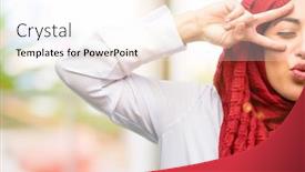  Presentation with kiss - PPT theme having young arab woman wearing hijab looking at camera through her fingers in victory gesture winking the eye and blowing a kiss background and a pink colored foreground