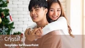  Presentation with ornament - Presentation consisting of young asian adult teenager couple hugging and celebrateing christmas holiday together in living room with christmas tree ornament decoration background and a tawny brown colored foreground