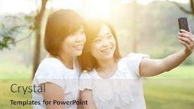  Presentation with females - Amazing PPT theme having young asian females having fun at outdoor park taking selfie using mobile phone camera sun flare background backdrop and a coral colored foreground