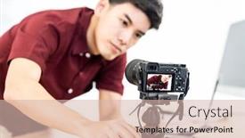  Presentation with social media camera - Cool new PPT layouts with young-asian-male-blogger-setting backdrop and a soft green colored foreground