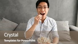  Presentation with popcorn - PPT theme enhanced with young asian man eating popcorn background and a violet colored foreground