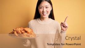  Presentation with french pastry - Audience pleasing PPT layouts consisting of young-asian-woman-holding-french backdrop and a coral colored foreground