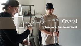  Presentation with videographer - PPT theme consisting of young-assistant-helping-photographer background and a gray colored foreground