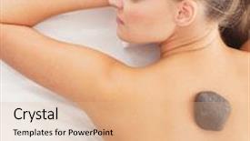  Presentation with treatment - PPT theme featuring young attractive woman getting hot stone treatment over white background background and a coral colored foreground