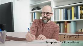  Presentation with student writing - Presentation design having young-bald-man-student-using background and a coral colored foreground