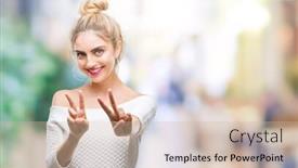  Presentation with blue eyes - Theme with young beautiful blonde and blue eyes woman over isolated background smiling looking to the camera showing fingers doing victory sign number two background and a soft green colored foreground