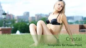  Presentation with green city - Amazing presentation design having young beautiful blonde woman in a black bathing suit posing while sitting on the green grass against the background of the city of moscow backdrop and a seafoam green colored foreground