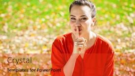  Presentation with forefinger - Amazing slide deck having young beautiful brunette woman has put forefinger to lips as sign of silence against green summer garden backdrop and a red colored foreground