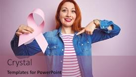  Presentation with cancer - PPT theme with young beautiful redhead woman holding cancer ribbon over pink isolated background with surprise face pointing finger to himself background and a coral colored foreground
