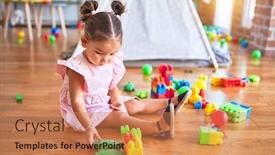  Presentation with building blocks - Audience pleasing PPT theme consisting of young-beautiful-toddler-sitting backdrop and a coral colored foreground
