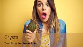  Presentation with avocado - Theme having young beautiful woman eating healthy avocado over yellow background scared in shock with a surprise face afraid and excited with fear expression background and a gold colored foreground