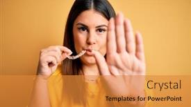  Presentation with orthodontic - Amazing slide set having young-beautiful-woman-holding-dental backdrop and a gold colored foreground
