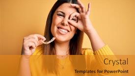  Presentation with orthodontic - Cool new slide set with young-beautiful-woman-holding-dental backdrop and a gold colored foreground