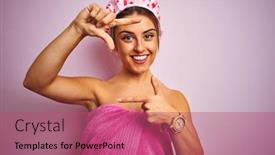  Presentation with frame pink - Cool new presentation with young beautiful woman wearing towel and shower cap over isolated pink background smiling making frame with hands and fingers with happy face creativity and photography concept backdrop and a violet colored foreground