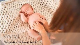  Presentation with newborn baby - Presentation featuring young beautifull woman and her baby on the sofa over blanket at home newborn and mother relaxing and resting comfortable background and a coral colored foreground