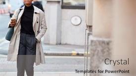  Presentation with street - Amazing PPT theme having young black businesswoman walking in the street in london holding smartphone selective focus backdrop and a light gray colored foreground