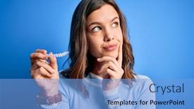  Presentation with dental - PPT theme consisting of young-blonde-girl-holding-dental background and a light blue colored foreground