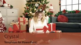  Presentation with christmas tree - Presentation theme with young-blonde-woman-unpacking-gift and a  colored foreground