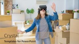  Presentation with simulation - PPT theme enhanced with young blonde woman wearing virtual reality glasses playing a simulation game around cardboard boxes moving to a new house background and a coral colored foreground