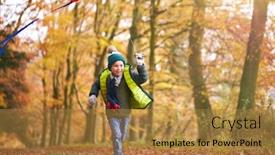  Presentation with fun - Colorful PPT theme enhanced with young-boy-having-fun-running backdrop and a gold colored foreground