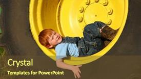  Presentation with ferrish wheel - Colorful presentation theme enhanced with young boy in tractor wheel backdrop and a tawny brown colored foreground