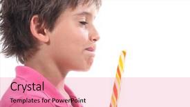  Presentation with lollypop - Beautiful theme featuring young boy licking his lips at the sight of his lollypop backdrop and a coral colored foreground