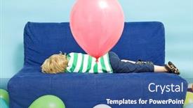  Presentation with birthday boy - Cool new slides with young boy lying down on a couch on his birthday backdrop and a ocean colored foreground