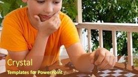  Presentation with chess - Cool new PPT theme with young-boy-making-a-move backdrop and a red colored foreground