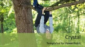  Presentation with young children playing multicultural - Audience pleasing PPT theme consisting of young boy playing and climbing backdrop and a yellow colored foreground