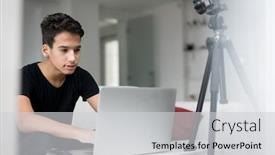  Presentation with equipment - Audience pleasing PPT theme consisting of young-boy-talking-online-using backdrop and a light gray colored foreground