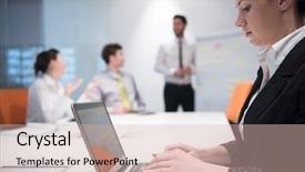  Presentation with board meeting - Slides featuring young business woman on meeting usineg laptop computer blured group of people in background at modern bright startup office interior taking notes on white flip board and brainstorming about plans background and a soft green colored foreground