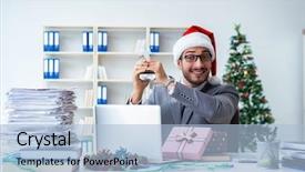  Presentation with prize - Presentation design consisting of young businessman celebrating christmas background and a  colored foreground