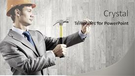  Presentation with nail - Cool new PPT theme with young businessman in suit and hardhat hammering nail in wall backdrop and a light gray colored foreground