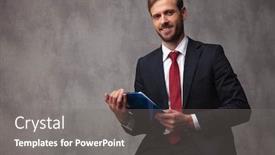  Presentation with notepad - Audience pleasing PPT theme consisting of young businessman sitting with a notepad and smiles studio picture backdrop and a gray colored foreground