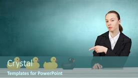  Presentation with rubber duck - PPT theme having young businesswoman pointing with finger at yellow rubber duck toy on table background and a ocean colored foreground