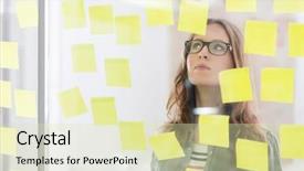  Presentation with reminders - Theme having young businesswoman reading reminders stuck background and a soft green colored foreground