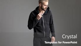  Presentation with studio - Presentation featuring young casual man standing and fixing his tracksuit while looking aside pensive on gray studio background background and a dark gray colored foreground