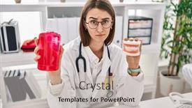  Presentation with denture - Slide deck having young-caucasian-dentist-woman-holding background and a soft green colored foreground